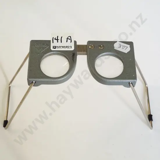 Japenese stero magnifier with folding legs