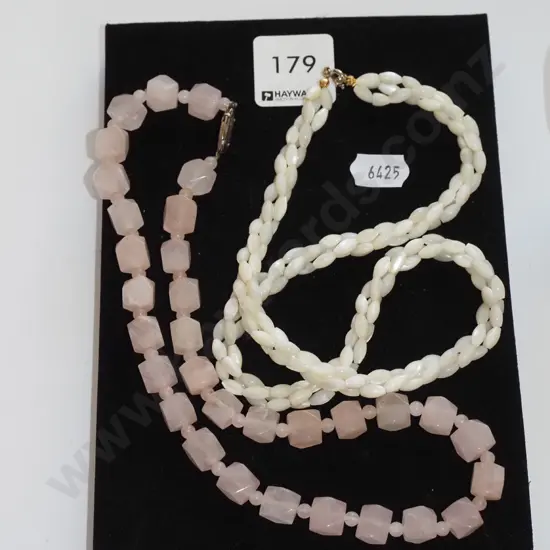 2x pink and cream stone necklaces