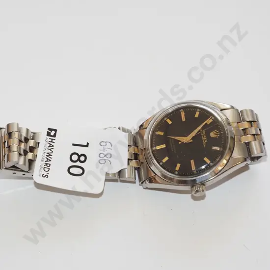 men's fake wristwatch (going but crown stem cog is slipping)