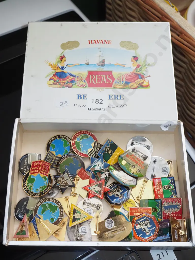 tray of various badges Image 1++