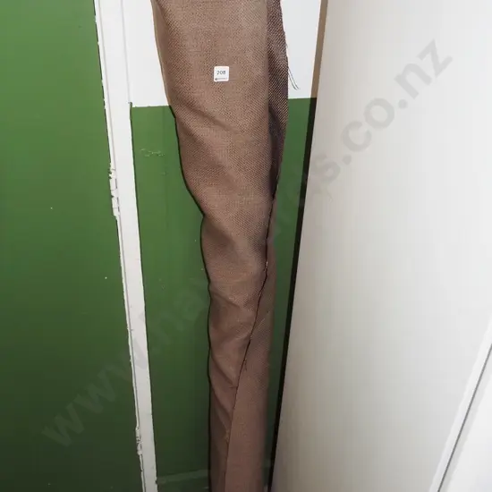 bolt of brown upholstery fabric