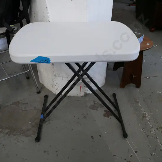 small plastic foldaway camping table