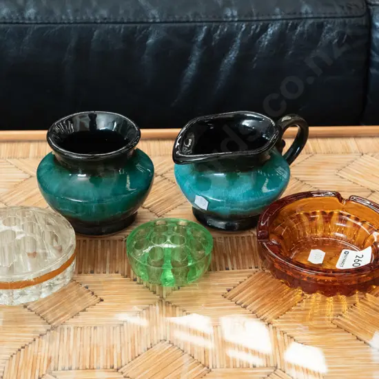 2x glass flower frogs, amber glass ashtray, Blue Mountain creamer and sugar