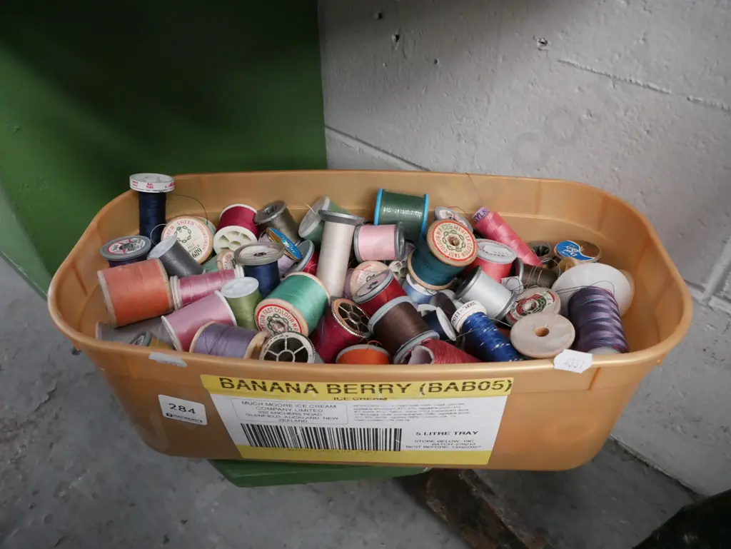 tub of sewing threads Image 1++