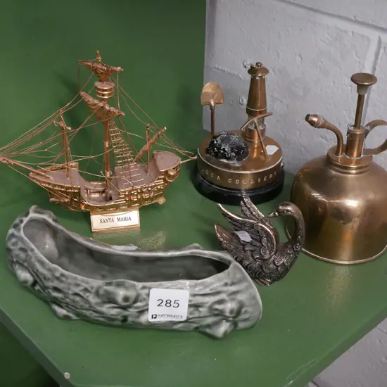 shelf; brass plant stay, Temuka trough vase, brass ship figurine etc