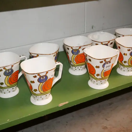 8x snail themed cups, plated cutlery