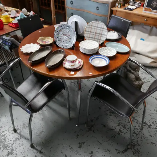 circular chrome based glass top dining table with 4 matching vinyl chairs - glass top table has mahogany