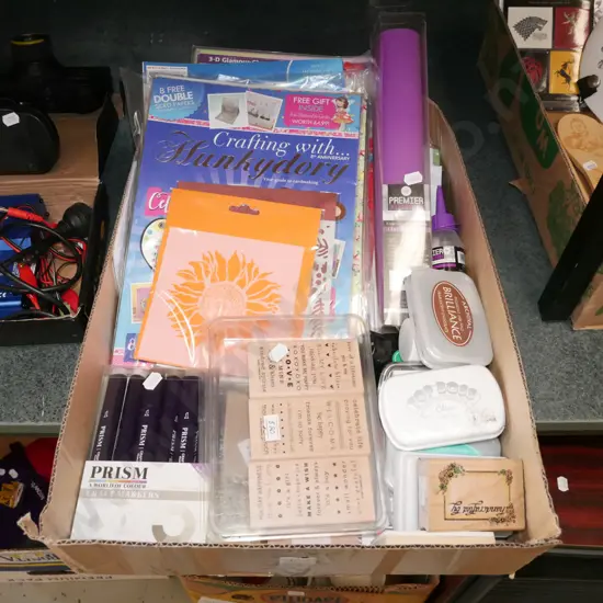 box; rubber stamps, craft markers etc