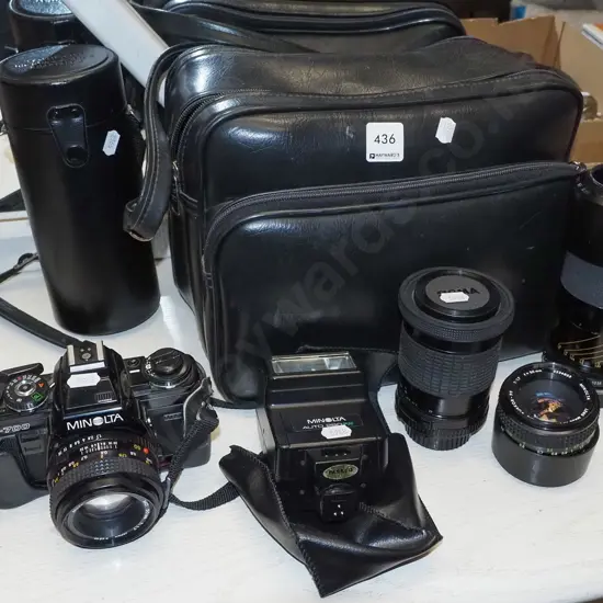 Minolta X-700 35mm camera with additional lenses, flash, carry bag etc