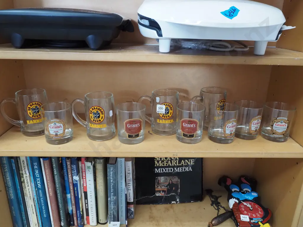 shelf; branded whisky tumblers, beer mugs Image 1++