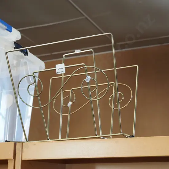 mid century wrought metal magazine rack