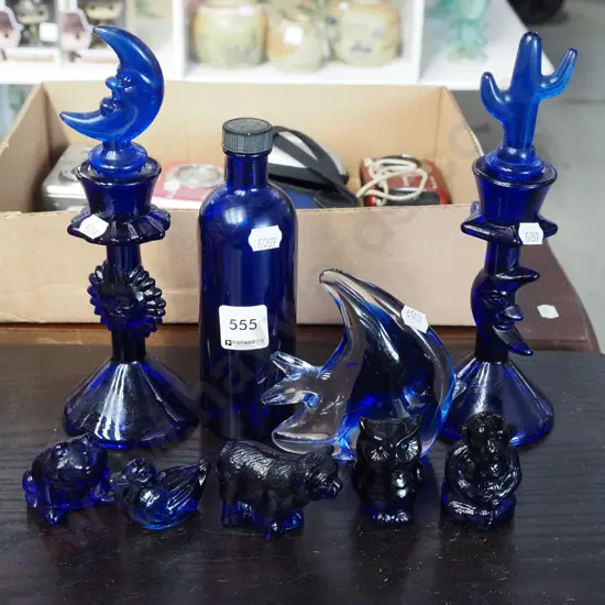 blue glass items; figurines, candlesticks, bottle stoppers etc H180