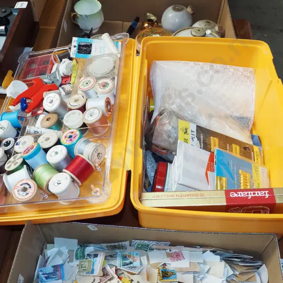 yellow plastic sewing box and contents; threads, scissors, needles etc