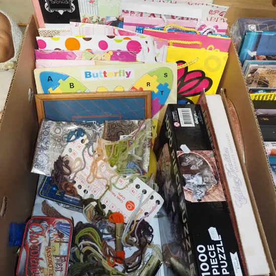 box; gift bags, 1000 piece puzzle, mini photo frames etc