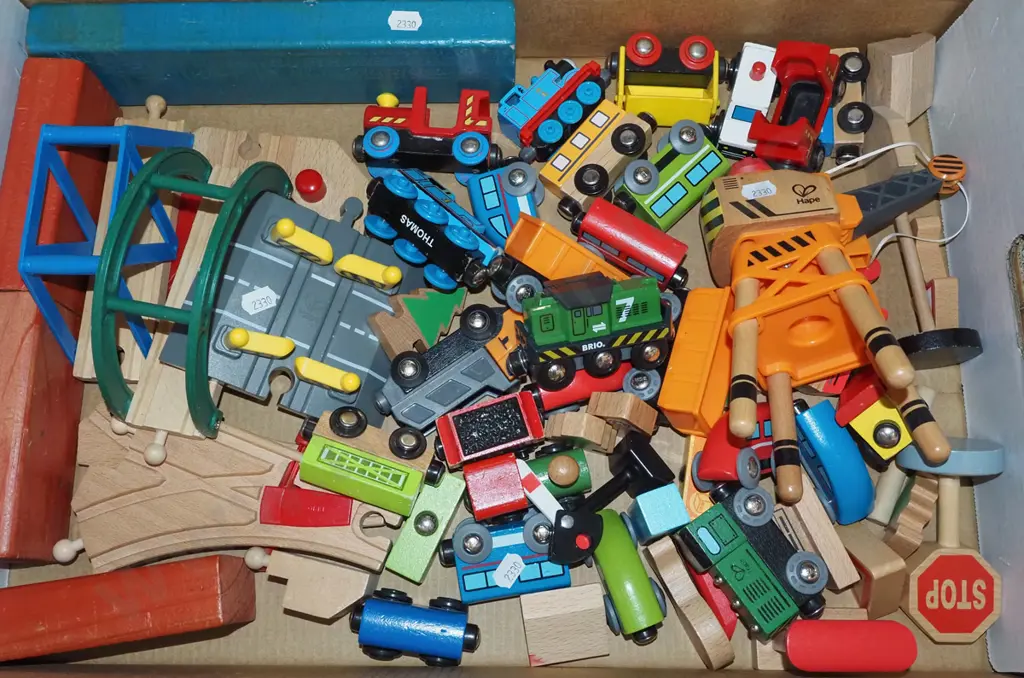 2x boxes of wooden toy railway items - Hape, Brio, Thomas the Tank Engine and others Image 1++