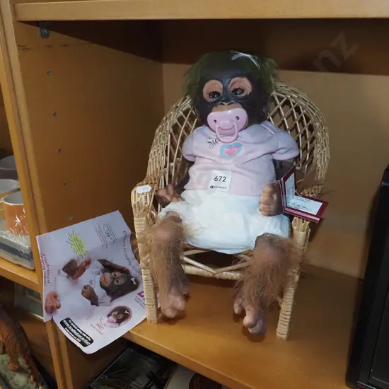 orangutan doll and chair