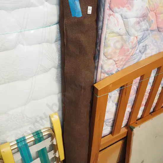 roll of woven brown upholstery fabric 