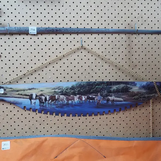 decorative reproduction print on small double handled saw - cattle 