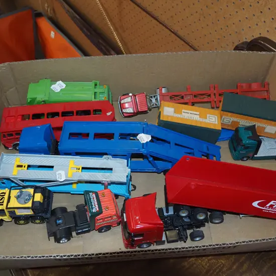 box of toy vehicles