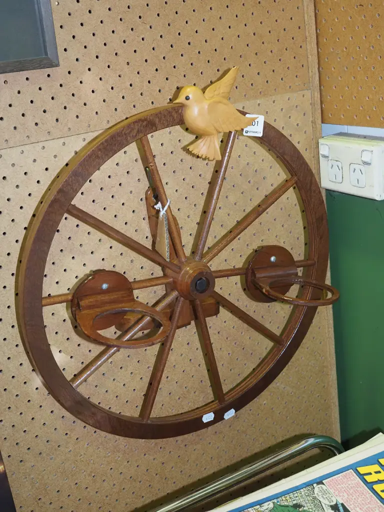 wall mounted wooden wheel with carved bird and 2x cup holders Image 1++
