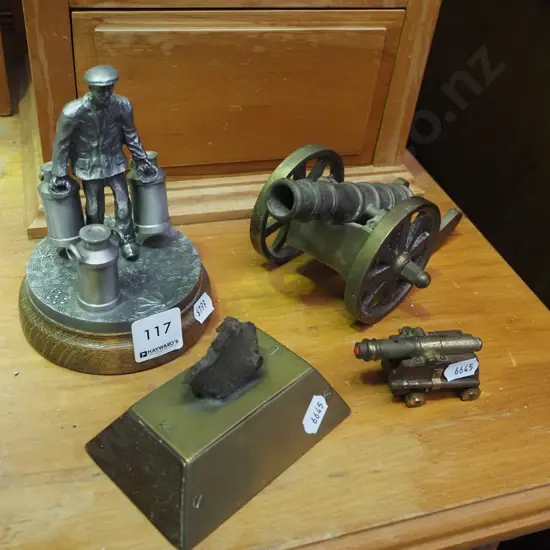 2x model cannons, milkman figurine, piece of ore on stand