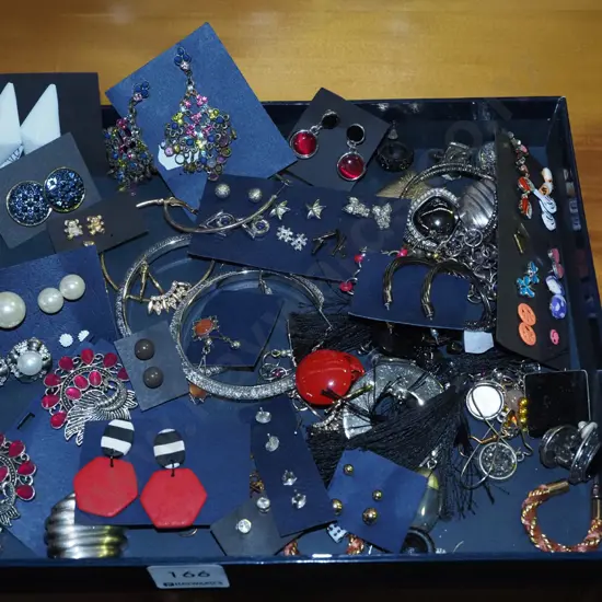 tray of costume earrings