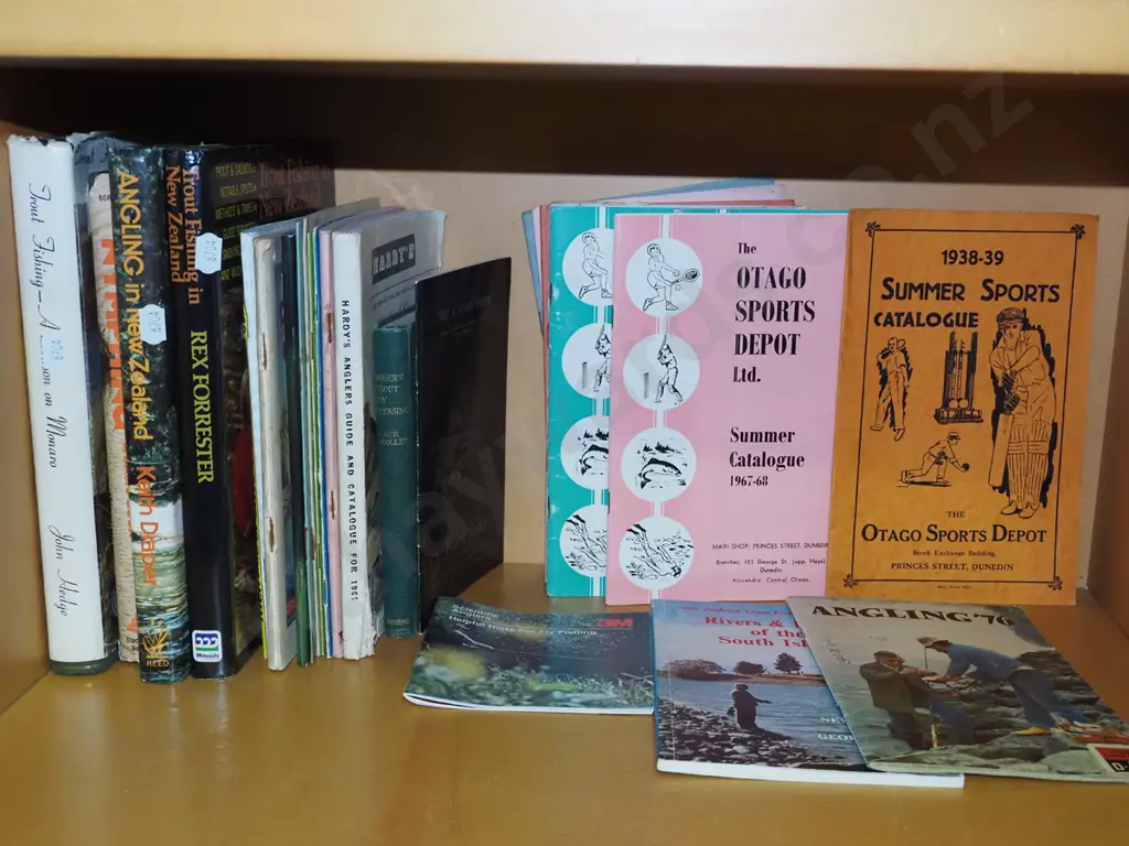 shelf of sporting and fishing books Image 1++