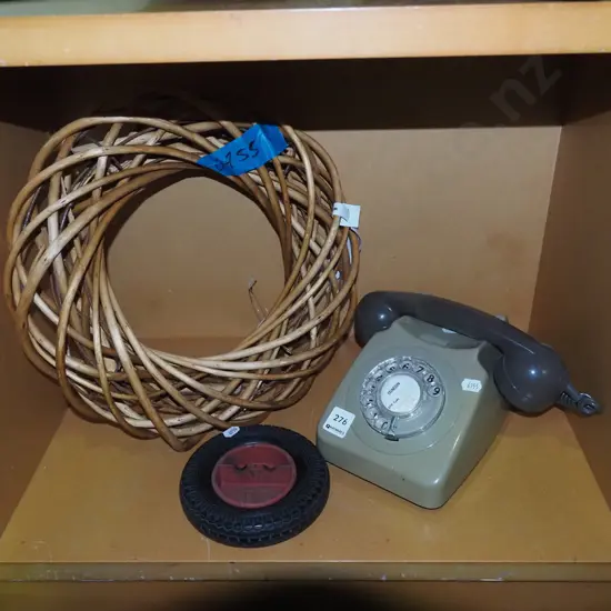 cane wreath, dial telephone, tyrehemed ashtray