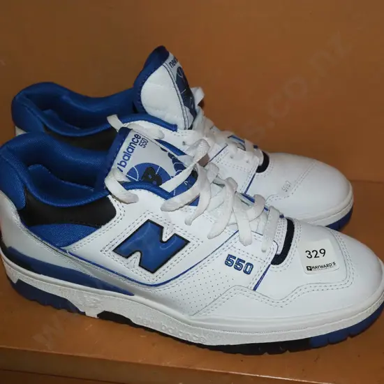 pair of New Balance UK 8.5 sneakers