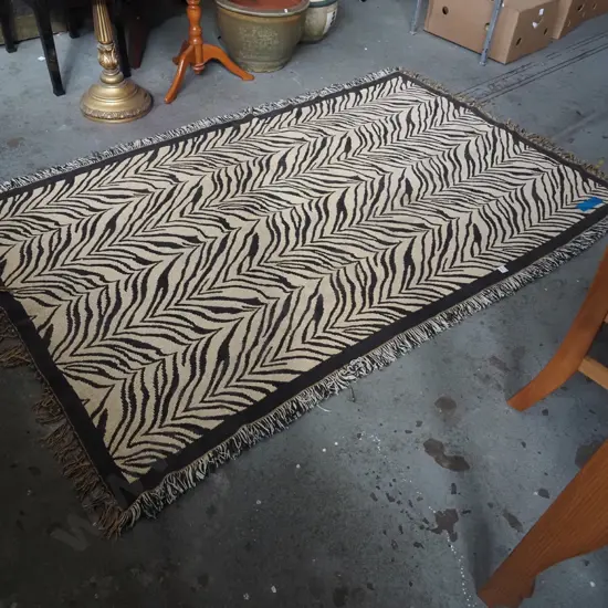 light weight black and fawn striped tasselled edge woven floor mat L1930 W1140