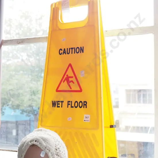 janitor's wet floor sign