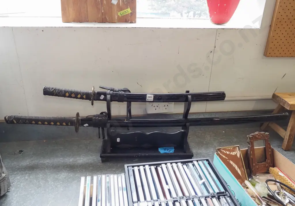 2x Japanese swords on stand Image 1++