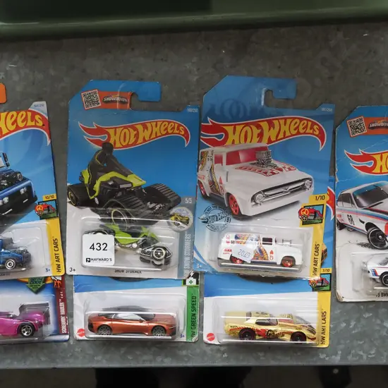 7x carded Hotwheels toy vehicles