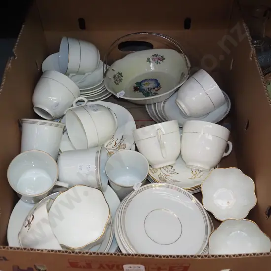 box; cups, saucers, plates, bowl