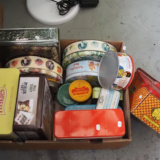box of vintage tins