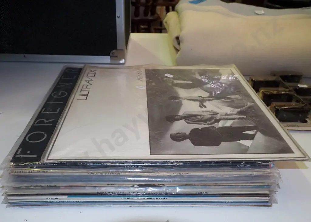 stack of LPs; Foreigner, Ultravox, Elton John etc Image 1++