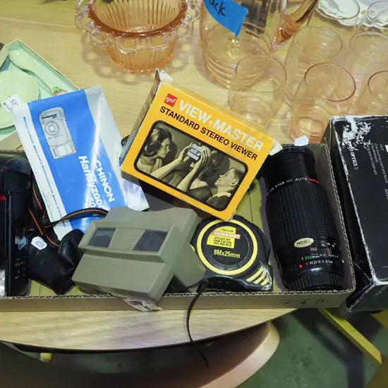 box; Chinon 35mm camera, viewmaster, Pentax zoom lens, tape measure
