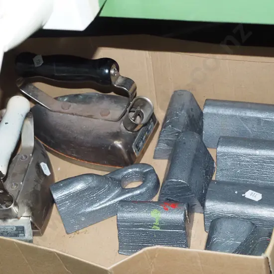 box; early electric irons, leg weights