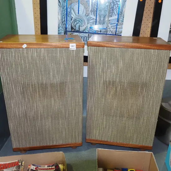 pair of unbranded floor stereo speakers