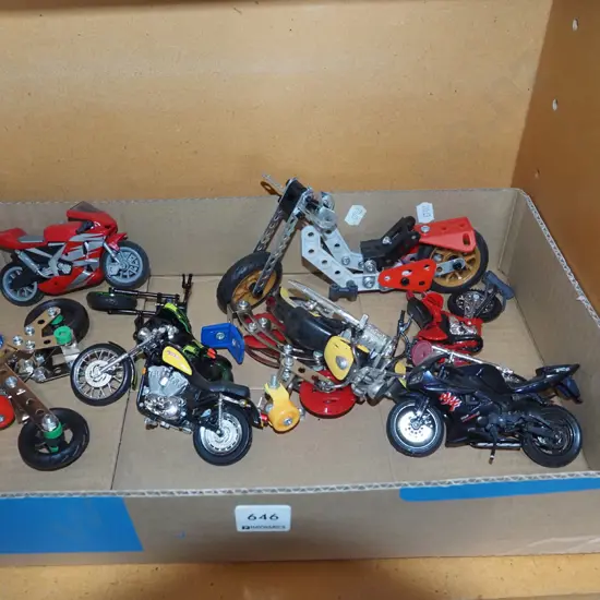 box of toy motorcycles