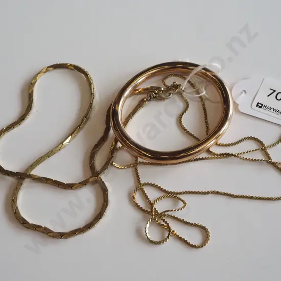 golden necklaces, copper bracelet