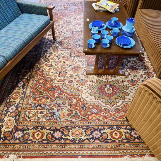 large Belgian wool Persian style floor rug - red, cream & blues. L-3300 W-2500