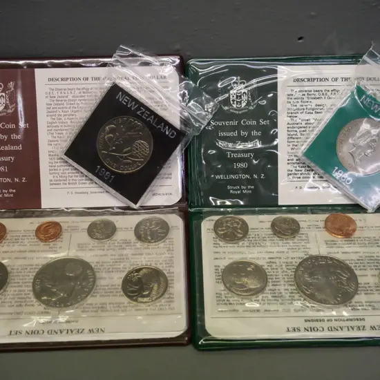 Cased New Zealand coin sets - 1980 and 1981 - souvenir sets with dollar and individual dollars