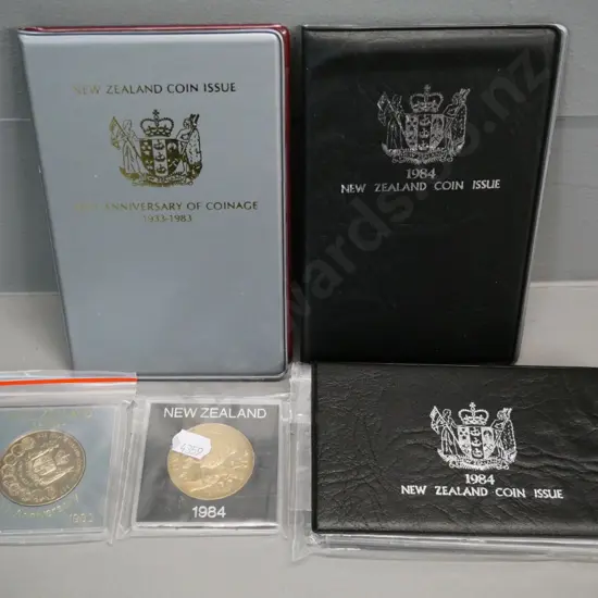 5 New Zealand collector coin items: 1983 collectors set,1984 cased proof set, 1984 collector set, 1983 and 1984 dollars