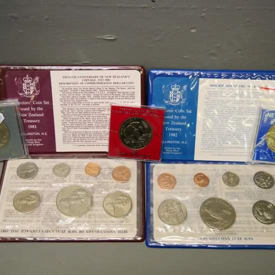 2 New Zealand coin sets - 1982 souvenir and 1983 50th anniversary of coinage - and 3 individual dollars 1982 & 83