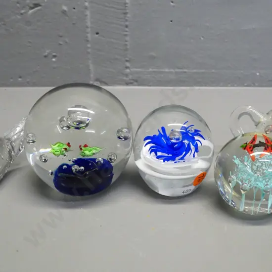 5 glass paperweights - 3 globes, one teapot and one bird-shaped - largest globe D-85