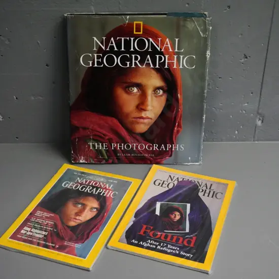 National Geographic Steve McCurry items: original 1985 "Afghan Girl" issue, 2002 follow-up & photo book, damage to cover