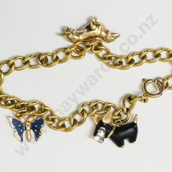 charm bracelet with 2 dogs & a butterfly no markings