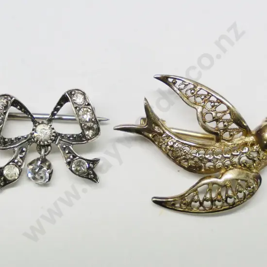 silver bow brooch & a silver bird brooch both stamped 925