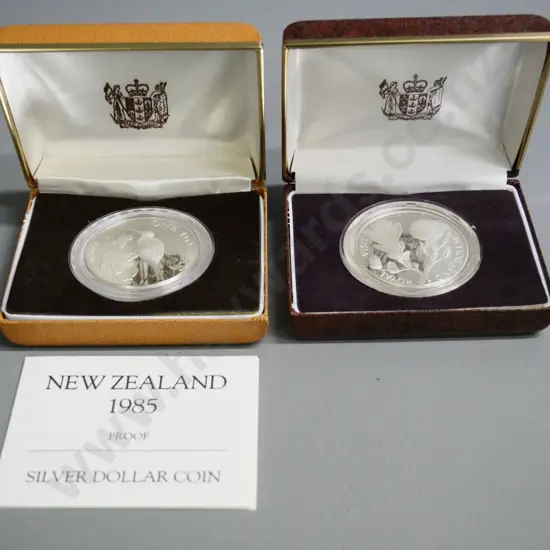 2 cased New Zealand silver dollars - 1981 Royal Visit and 1985 black stilt